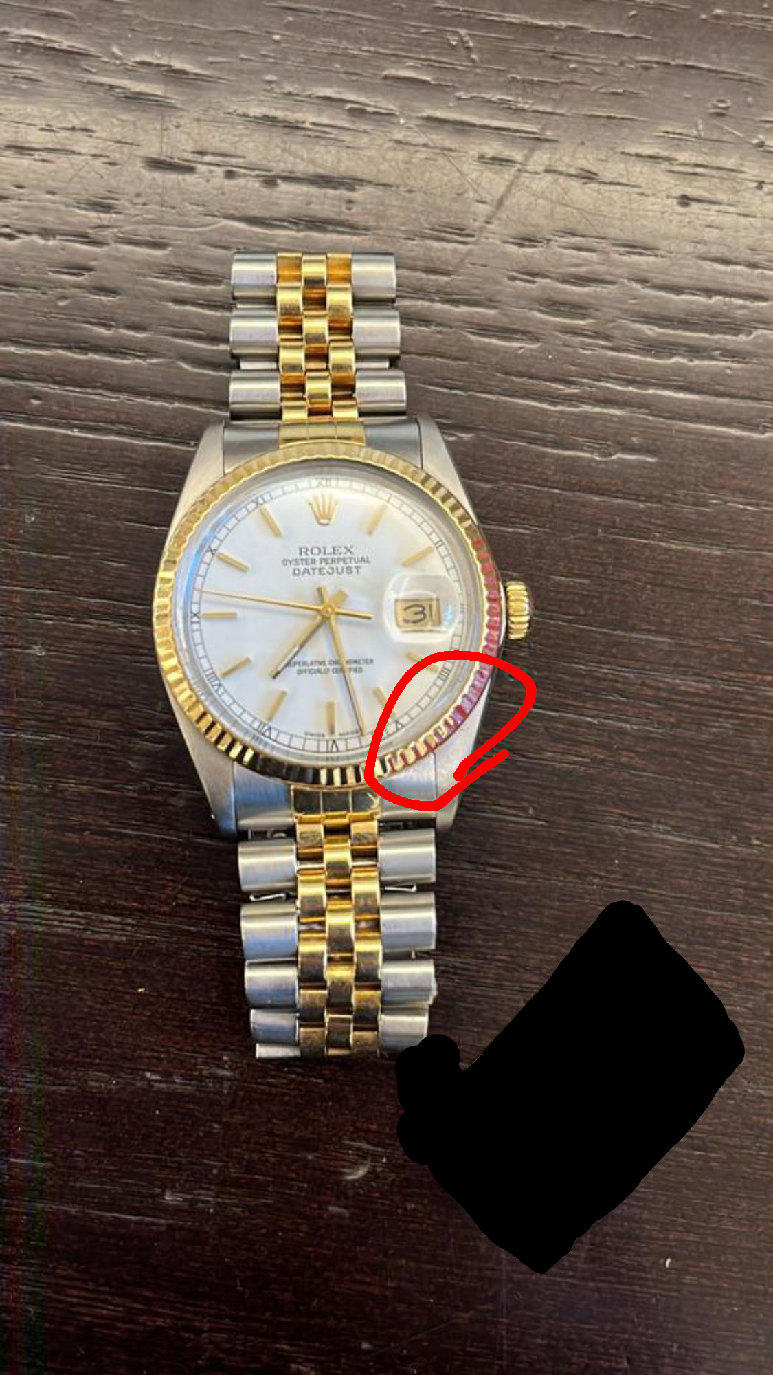 What does this rolex look like The scratch on the watch glass