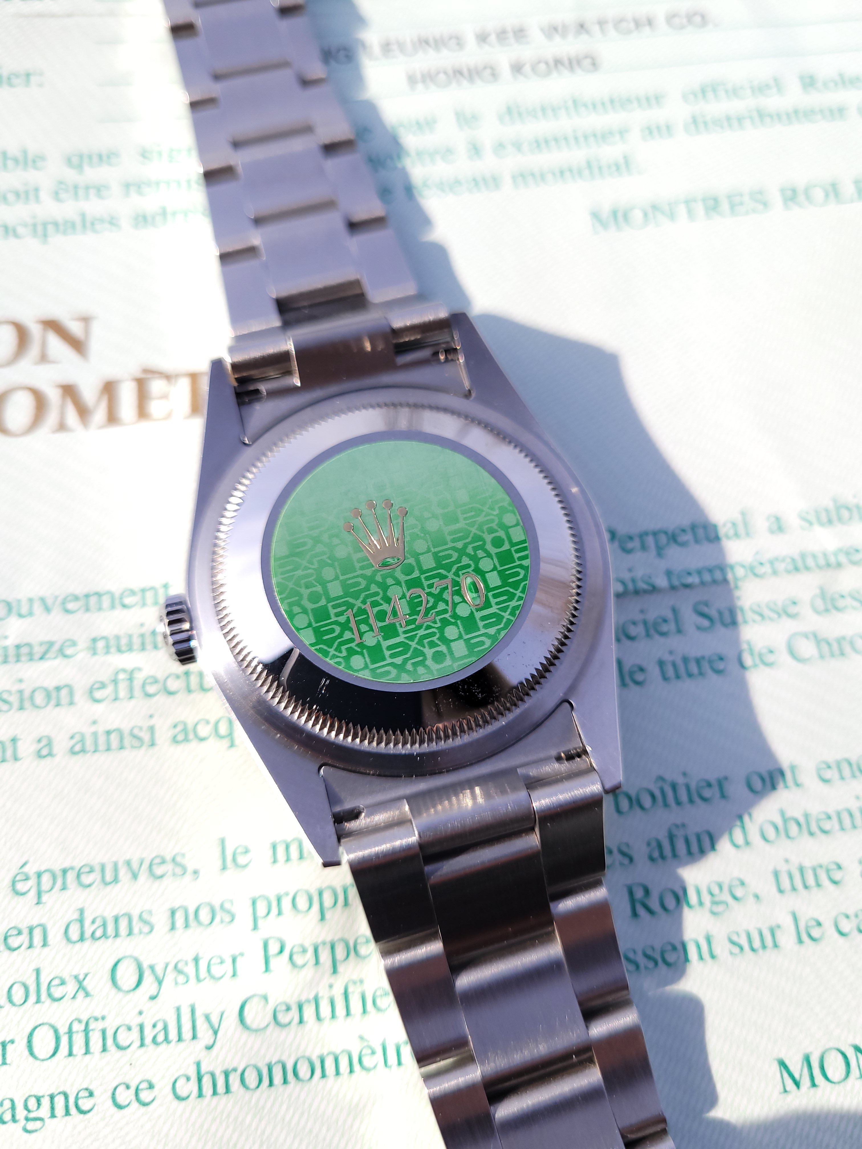 Rolex hot sale green sticker