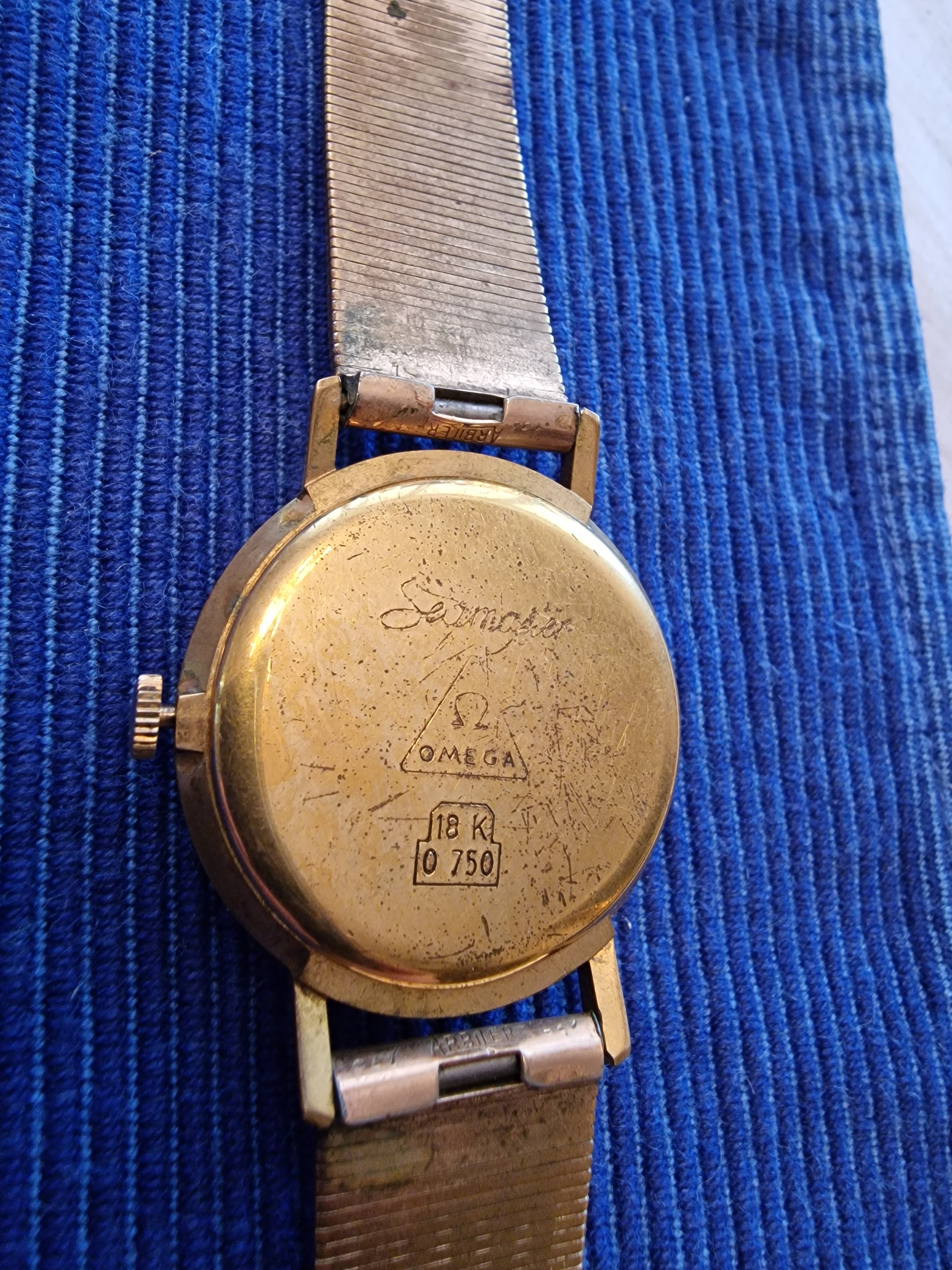 Omega best sale 18k 0750