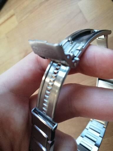 Seiko watch hot sale band clasp