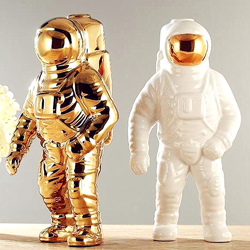 Gold omega astronaut statues? | Omega 