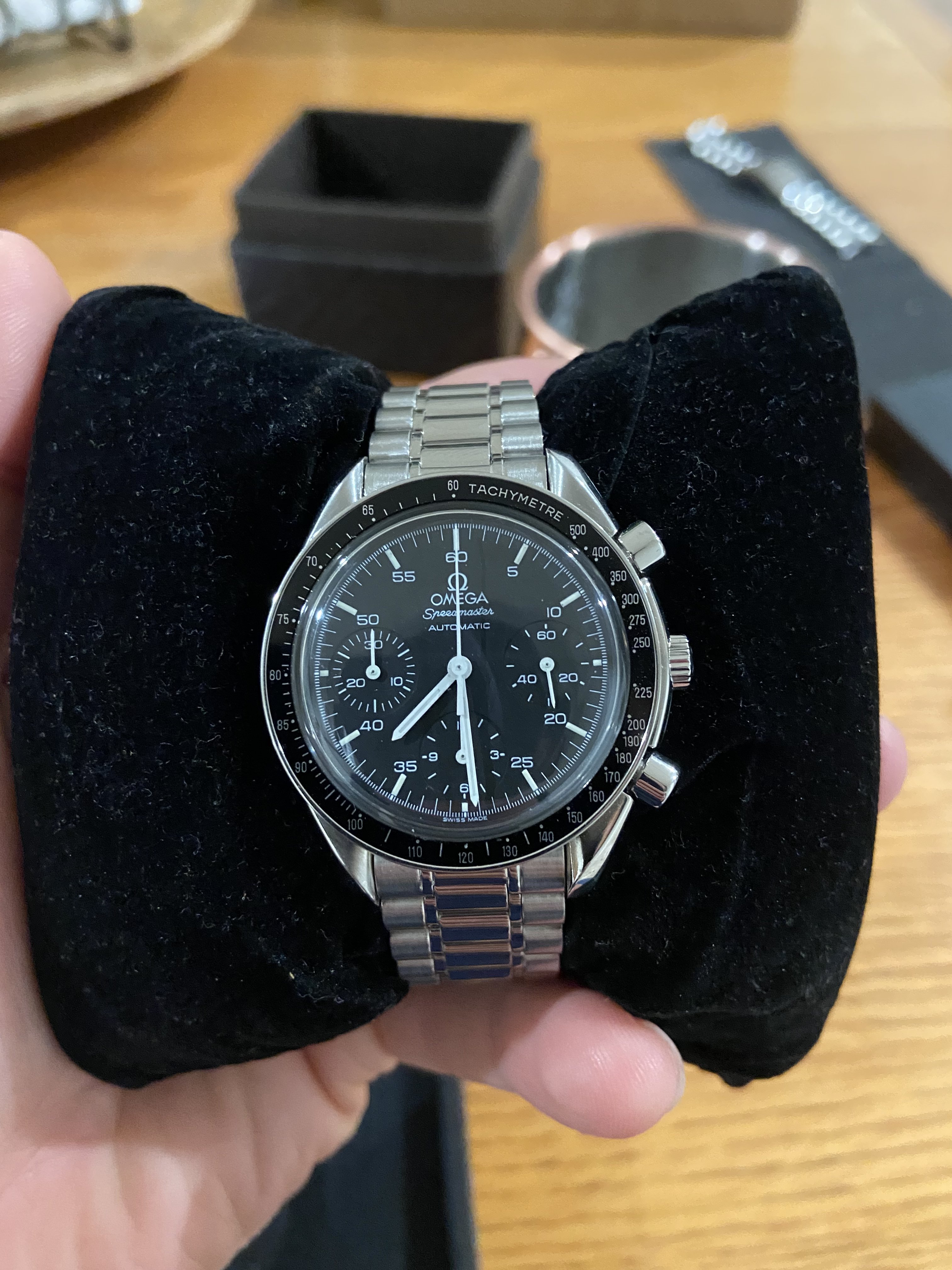 Omega speedmaster sale reduced service cost