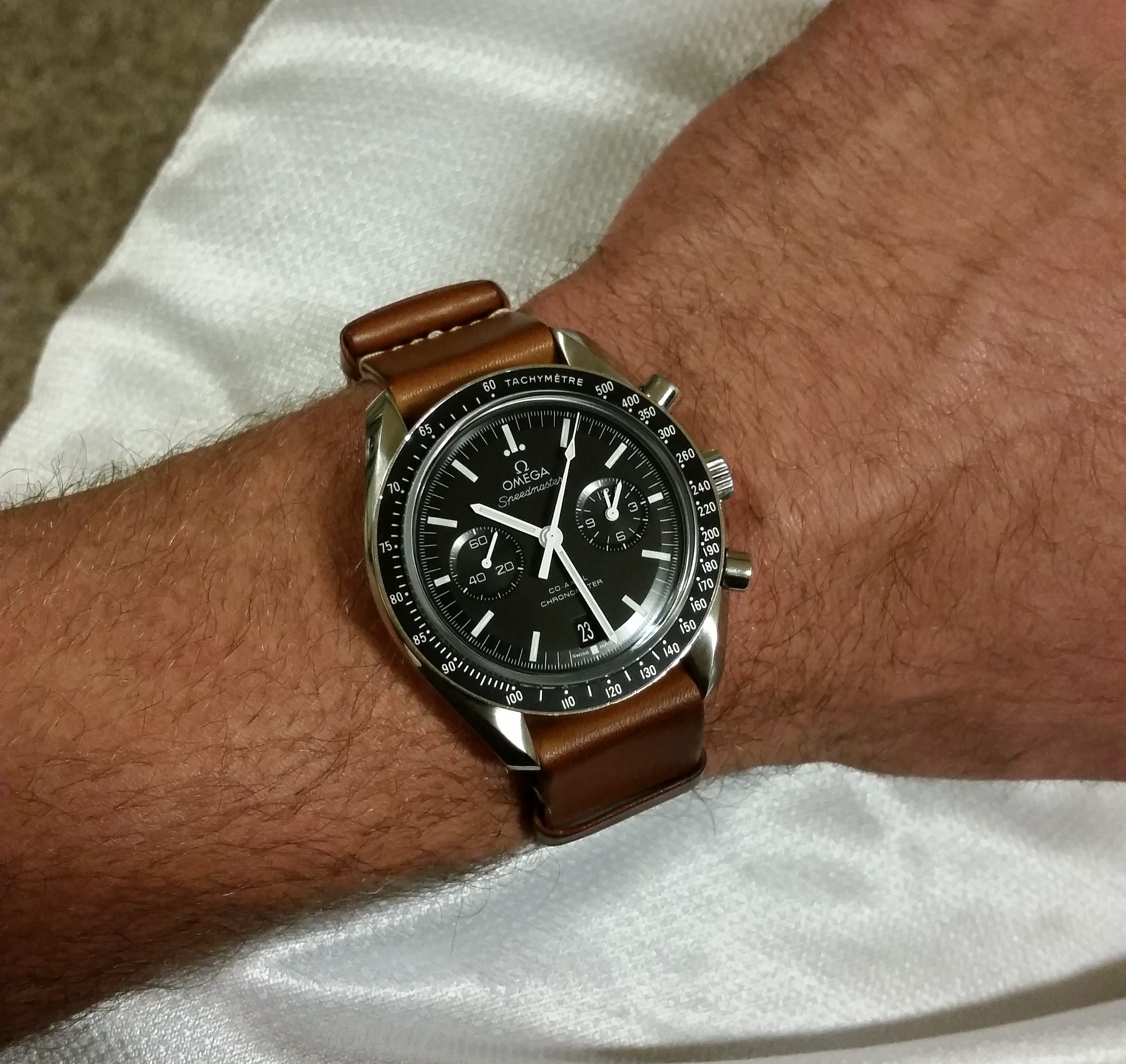 omega moonwatch wrist