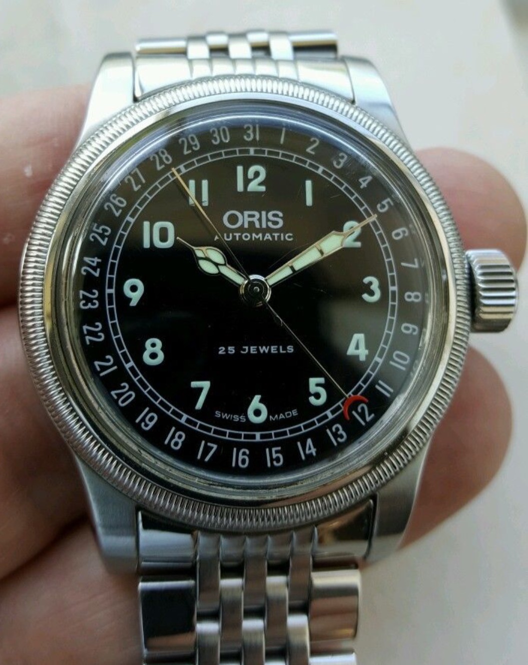 Can anyone identify this exact Oris And tell me details