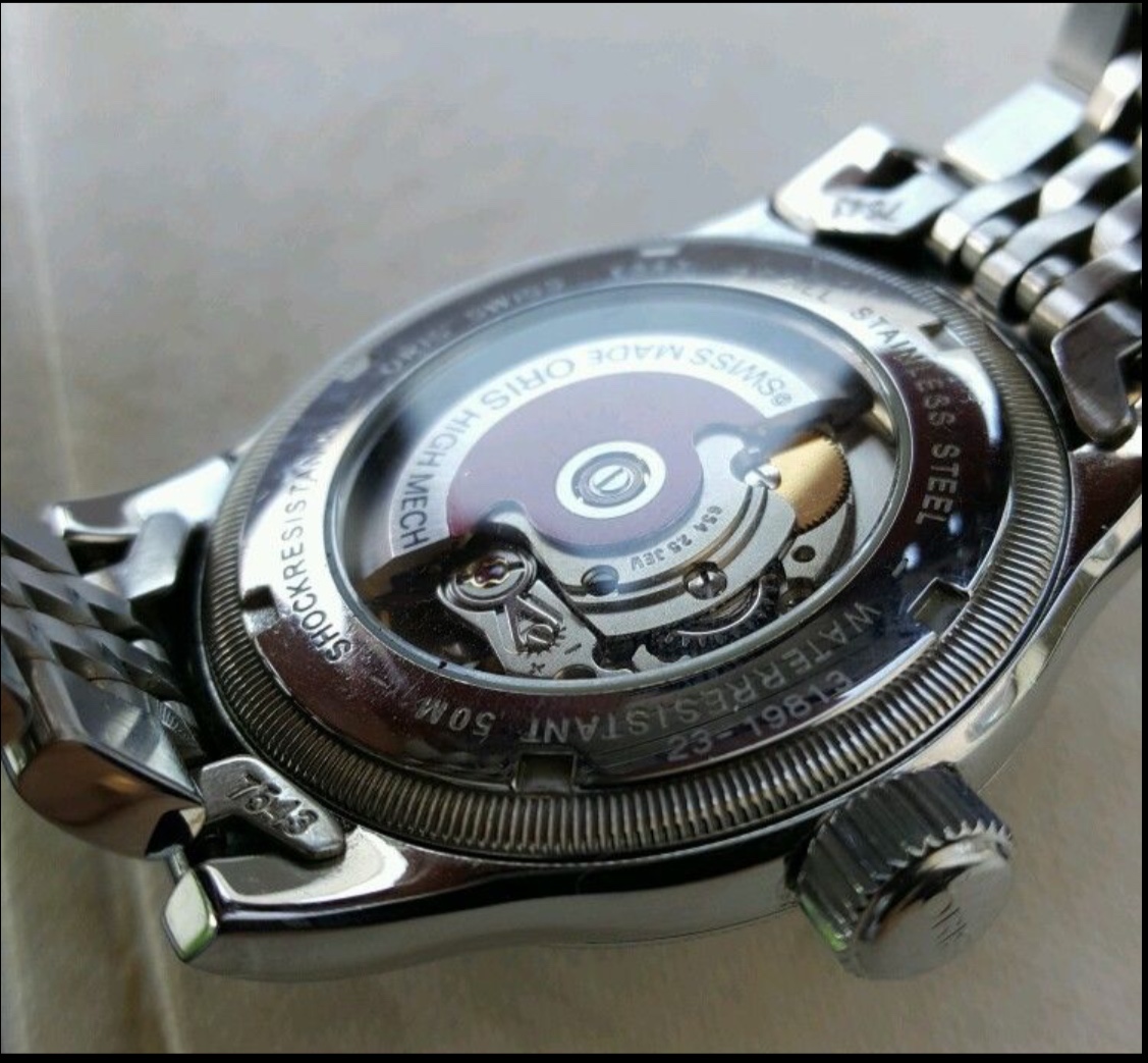 Can anyone identify this exact Oris And tell me details