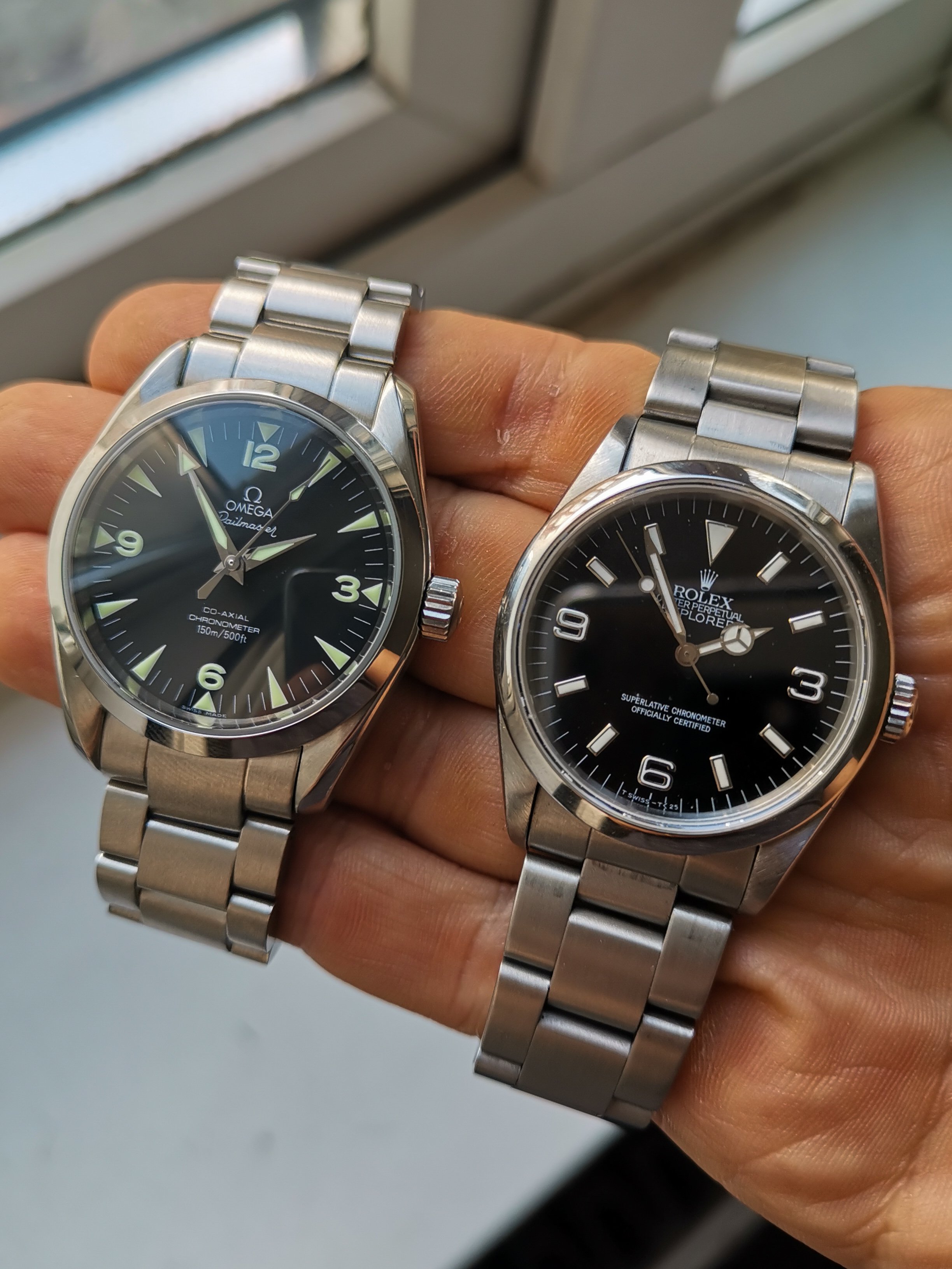 Rolex explorer 2025 vs omega railmaster