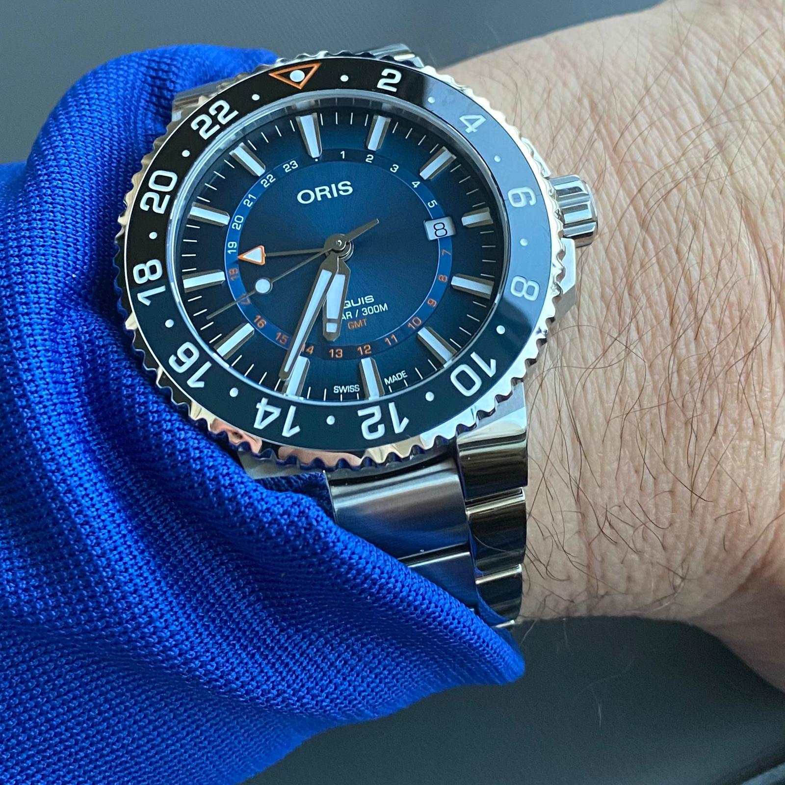 Oris aquis or tag aquaracer hotsell