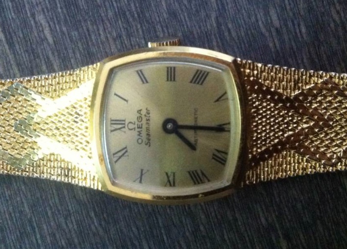 omega watch 18k 0.750
