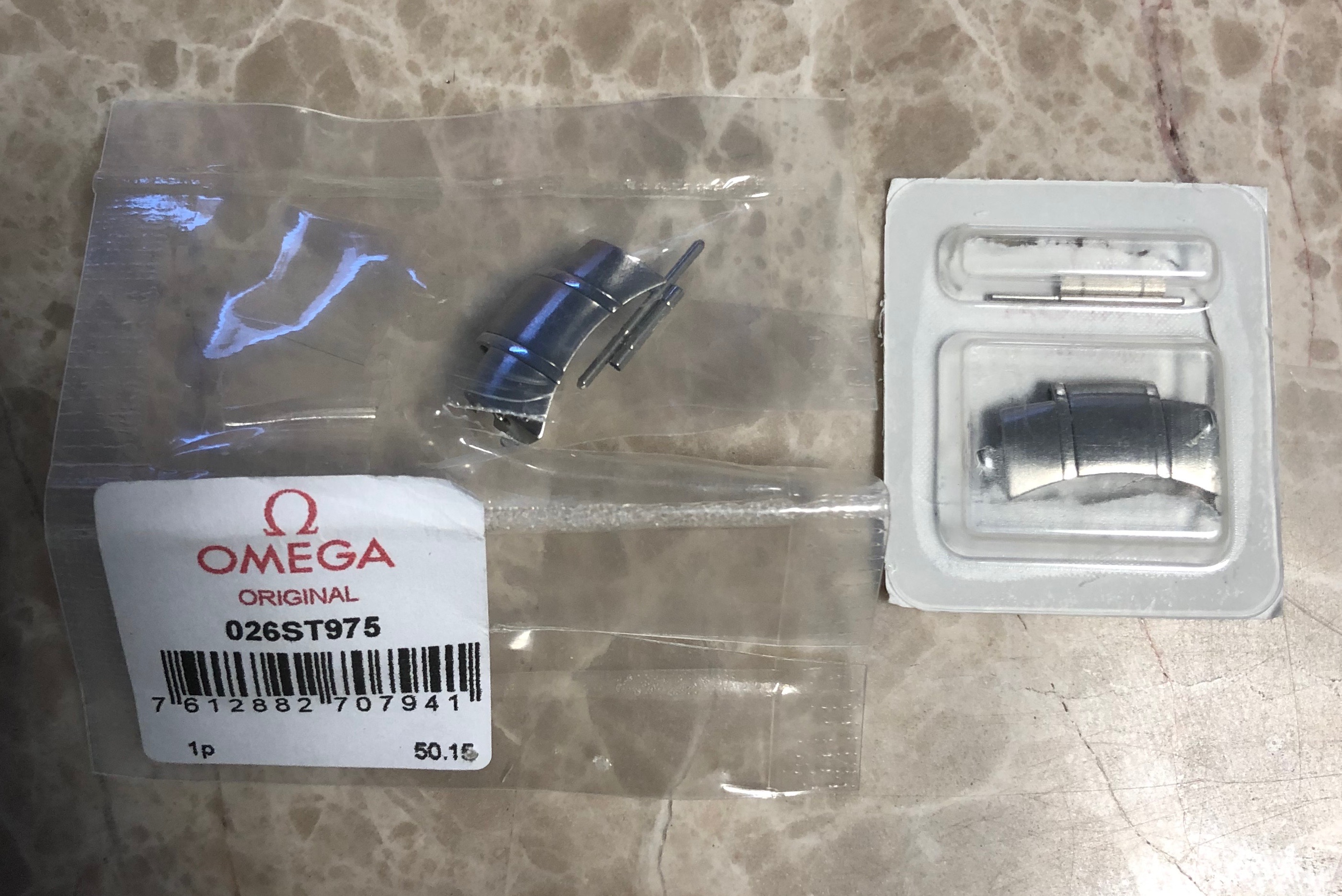 omega speedmaster 975