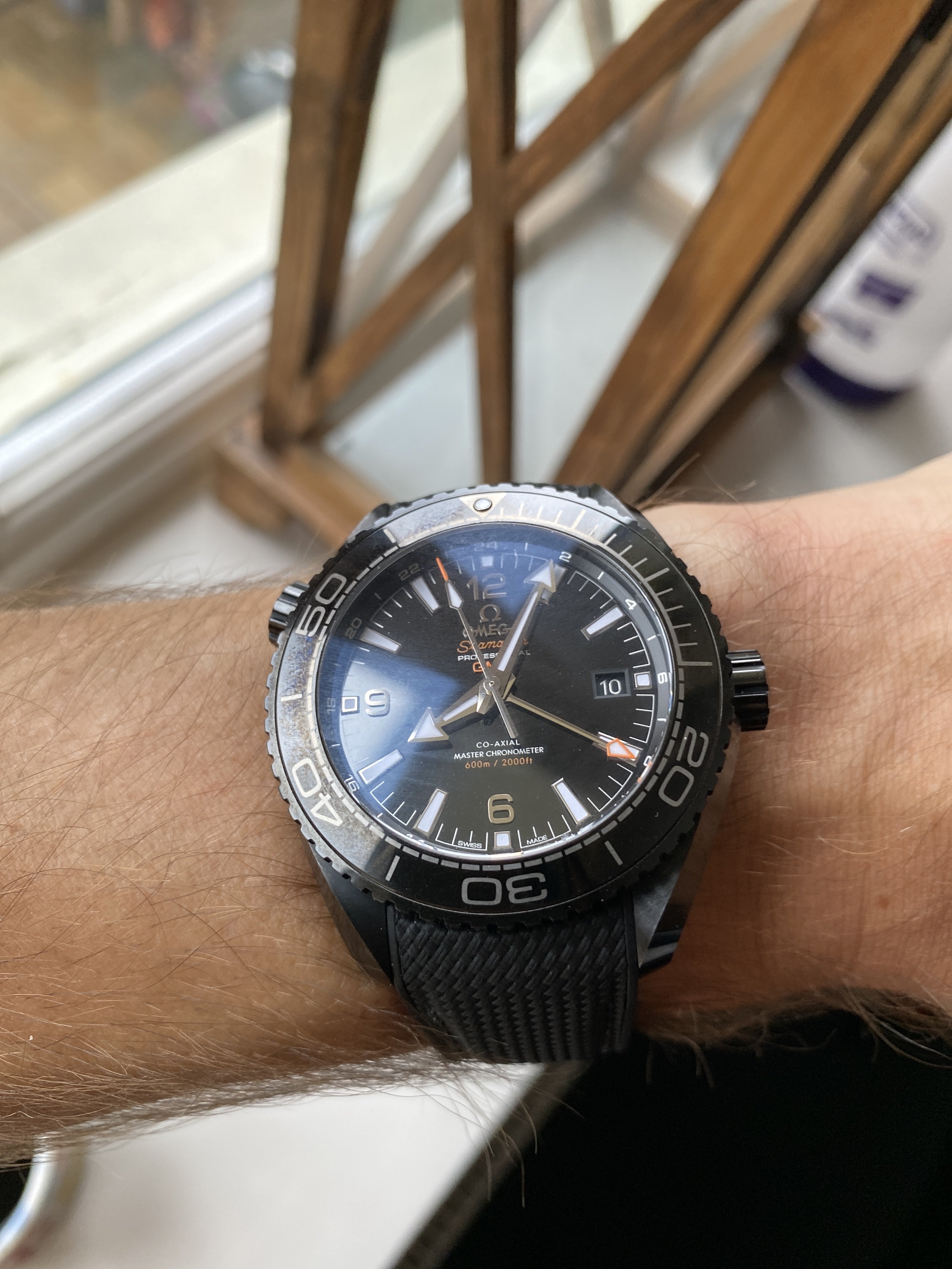 Omega planet ocean deep hotsell black review