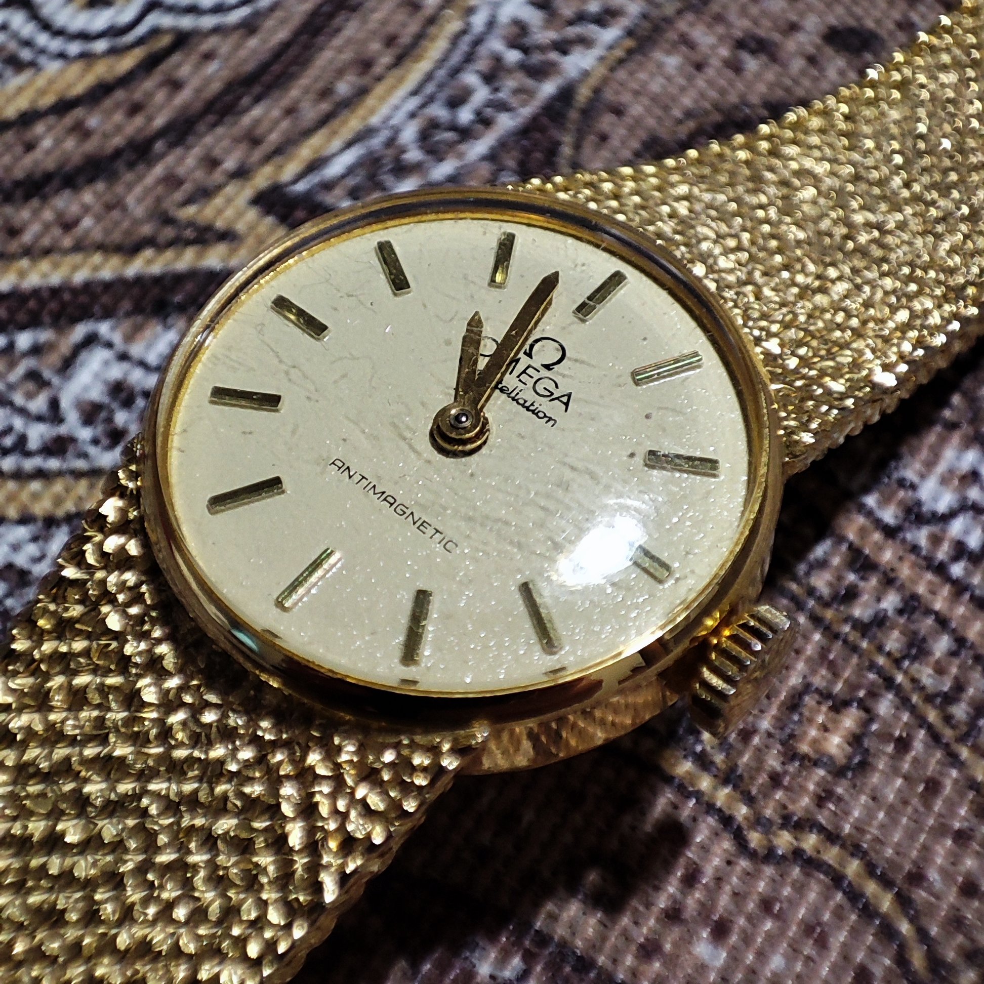 Omega 18k gold discount watch