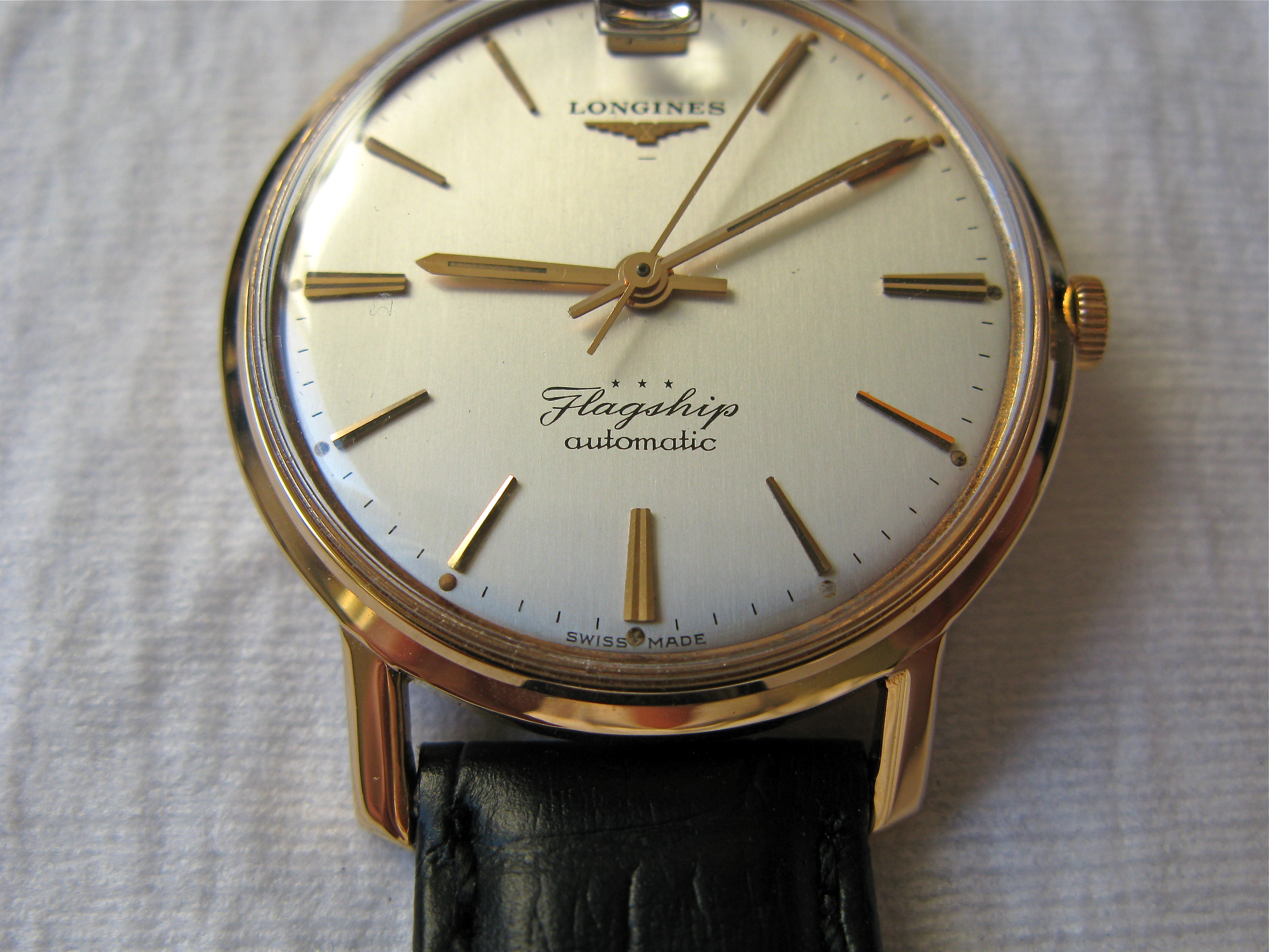 SOLD 1961 Longines Flagship automatic pink gold date at 12