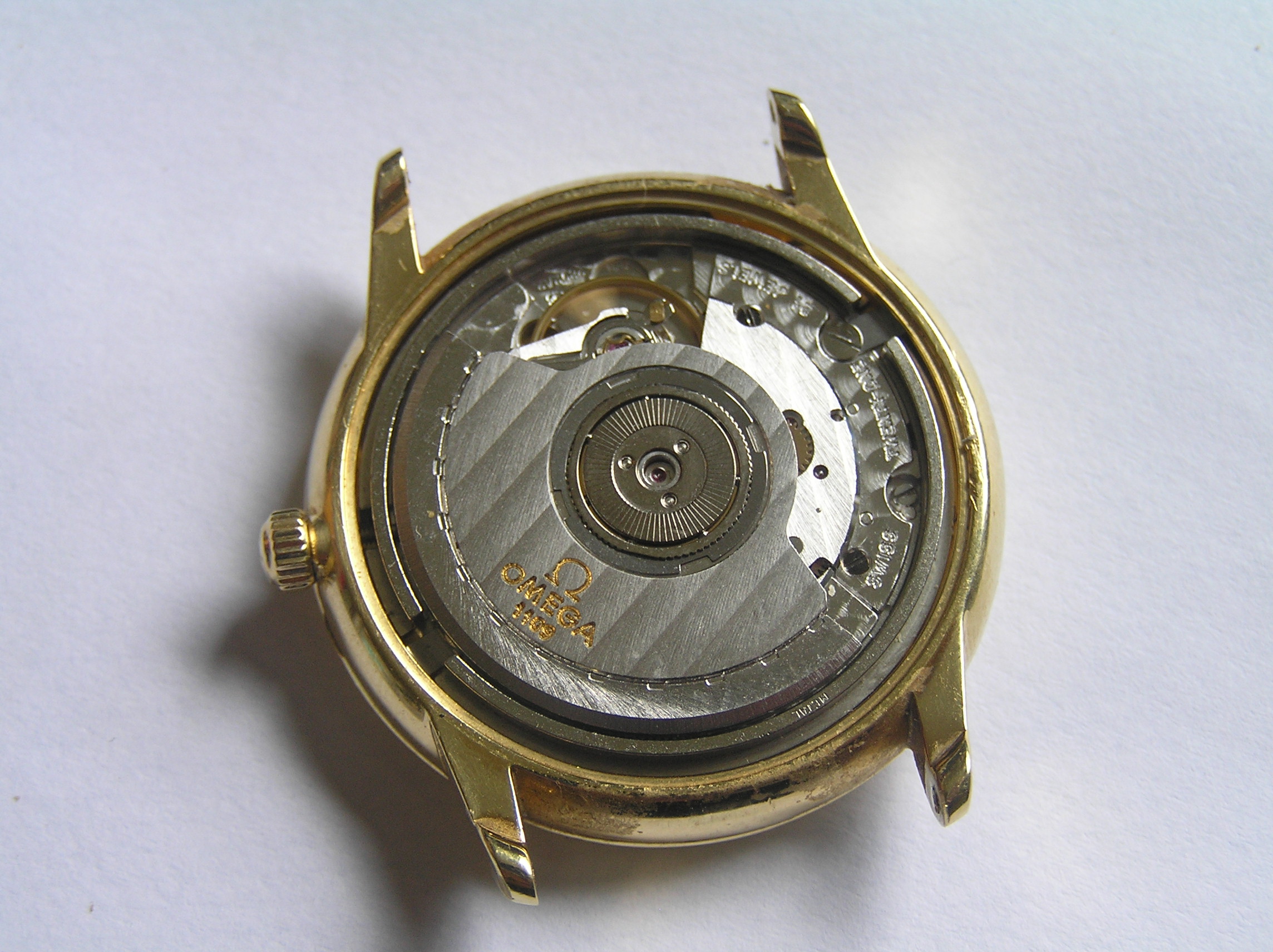 omega chronometer , cal 1109 gold or g 