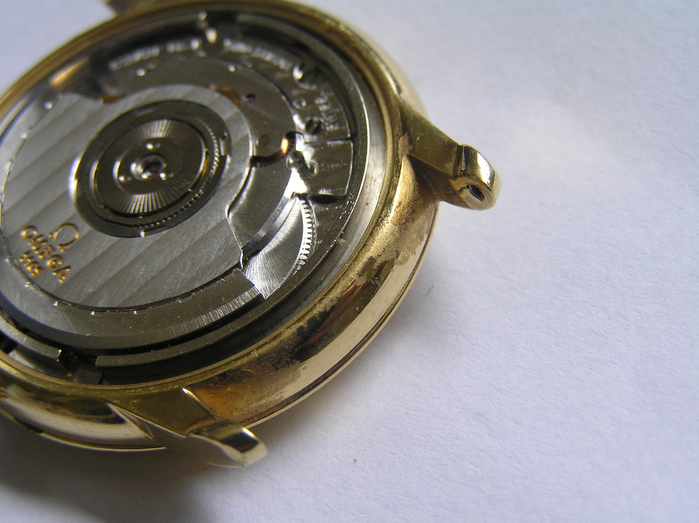 omega chronometer , cal 1109 gold or g 