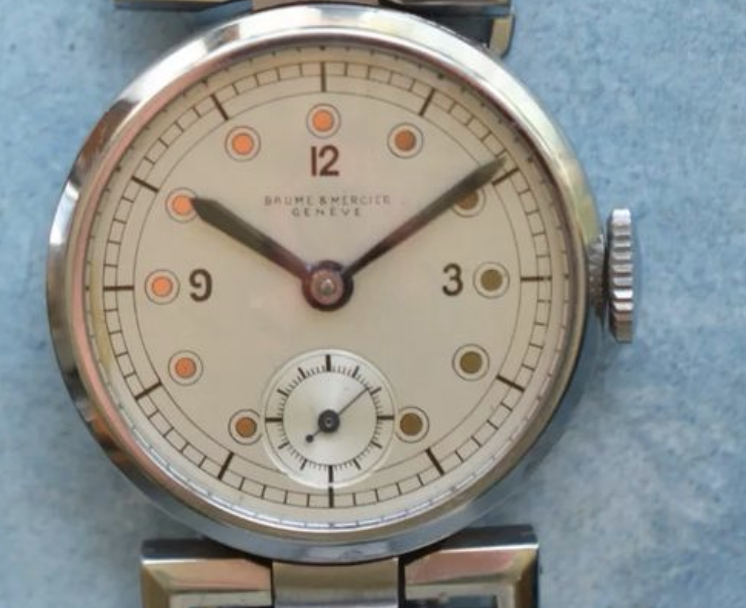 Suspicious but very cool Longines with mirror dot markers Omega