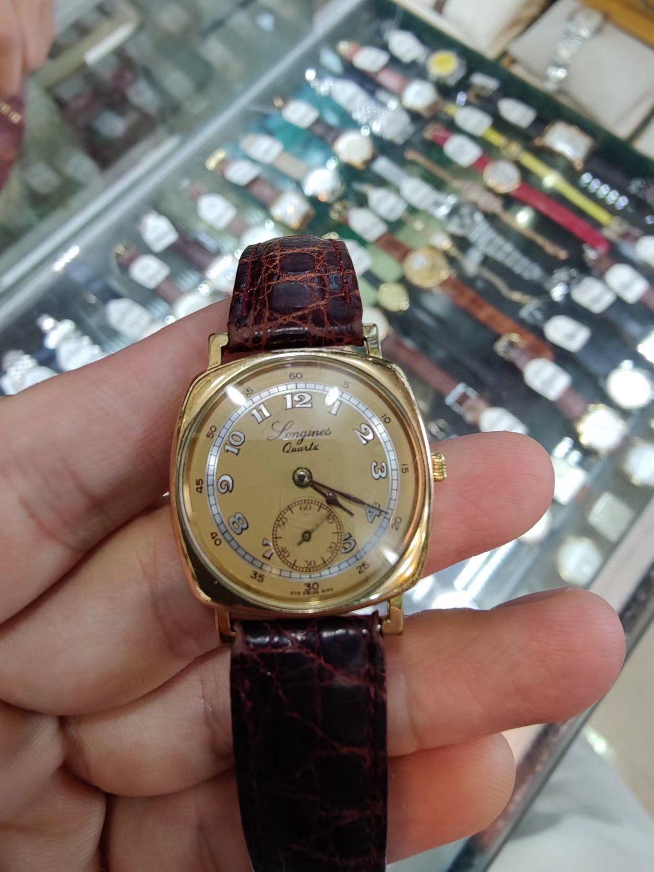 Need help to identify this vintage Longines quartz watch Omega