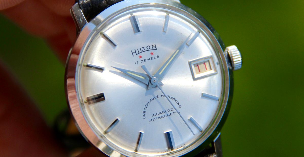 SOLD - Hilton Vintage Stainless Steel Nice Condition Red Date