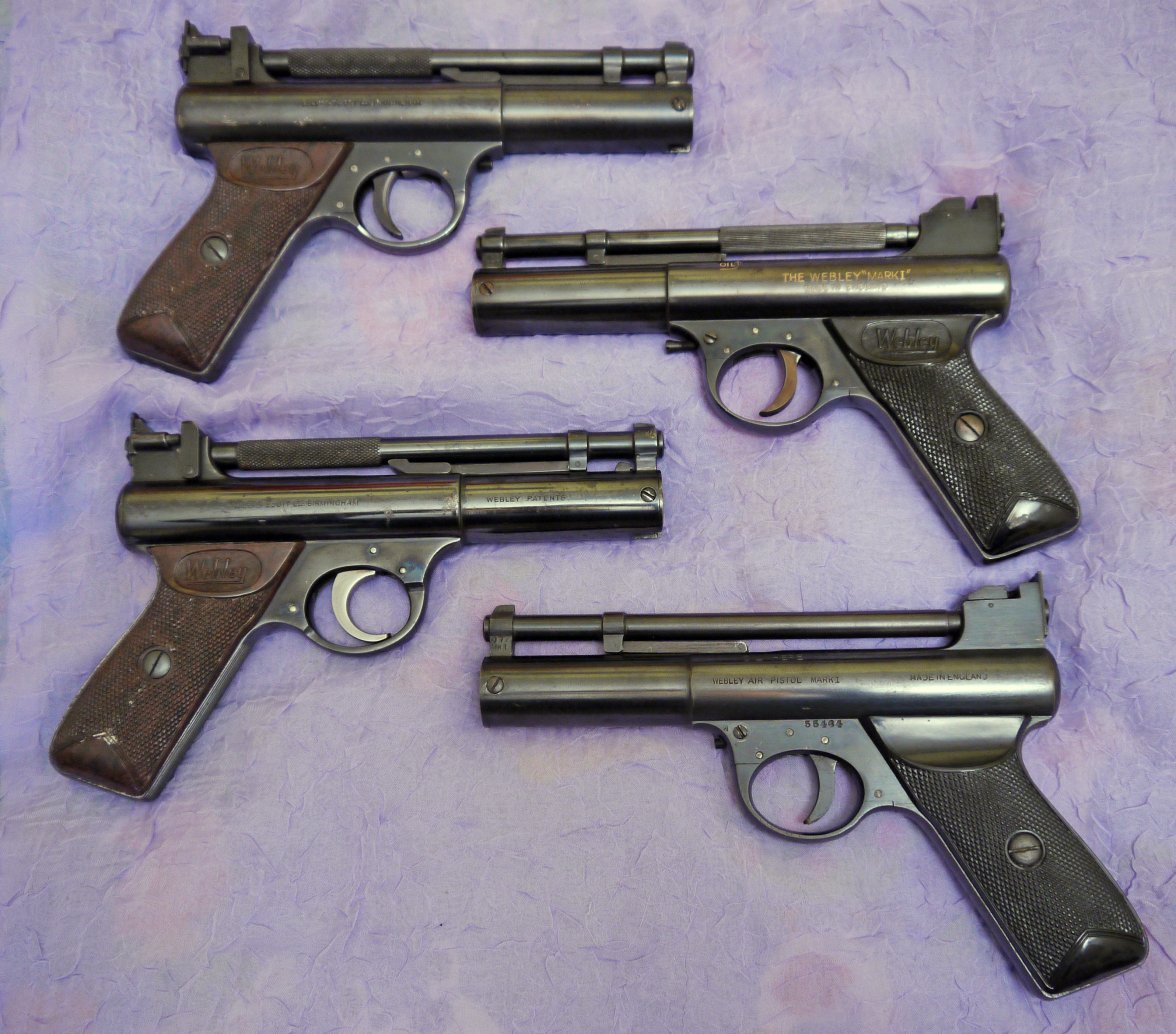 four webley pistols.jpg
