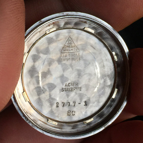 correct and rare to be in place the spring to hold the second case back.jpg