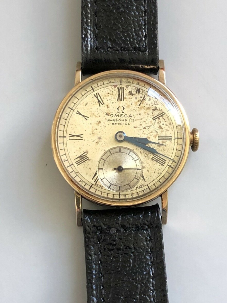 Vintage-9ct-Gold-Omega-Watch-Sold-By-Parsons.jpg