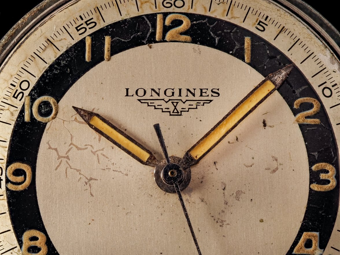 Longines-cal-12.68ZS,-6264,-bullseye,-35mm,-1954-logo.jpg