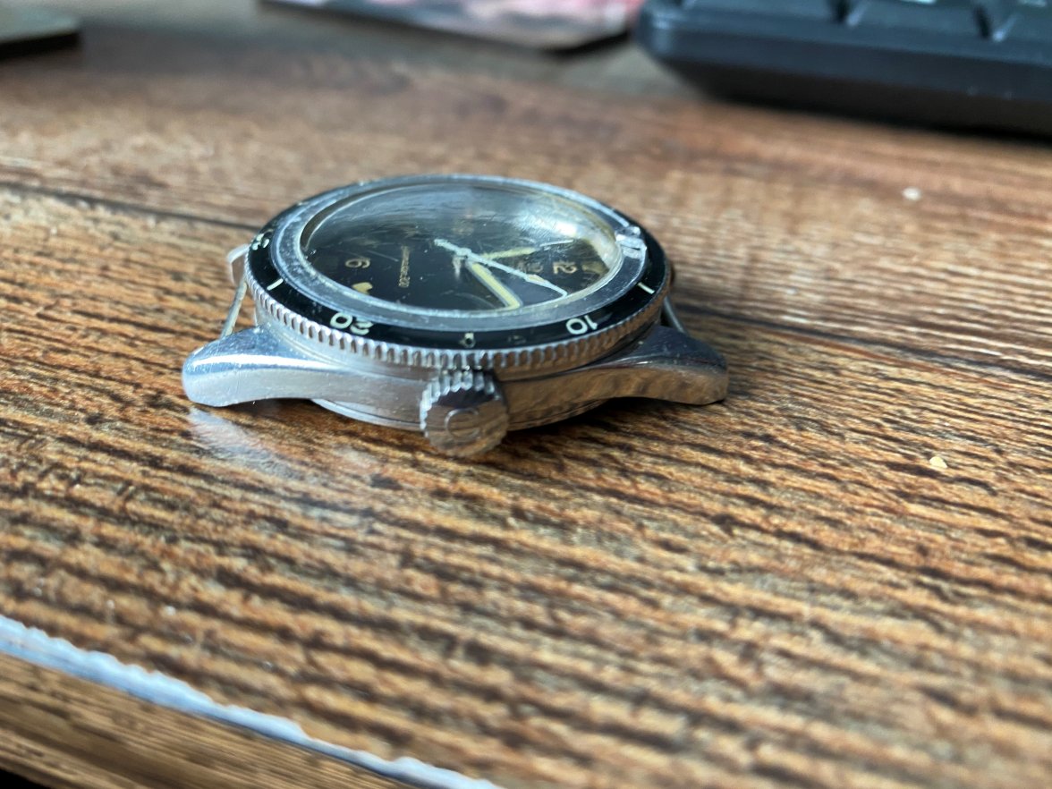 Omega Seamaster reference 165.014 side a.jpg