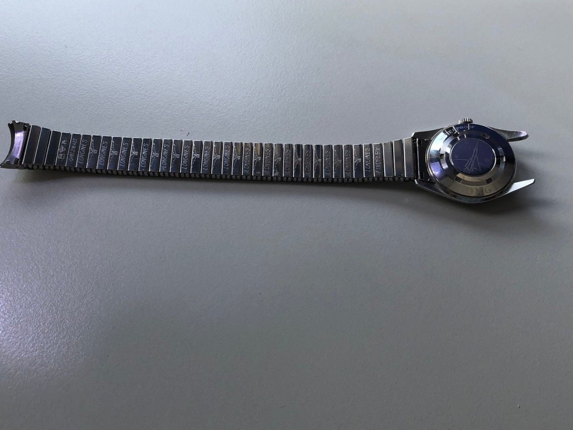 BACK OF CASE AND BRACELET.JPG BACK OF CASE AND BRACELET.JPG