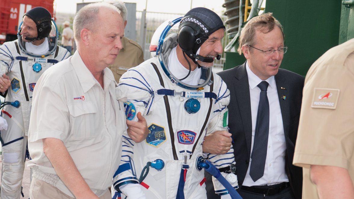 Parmitano Escorted to Soyuz.jpeg