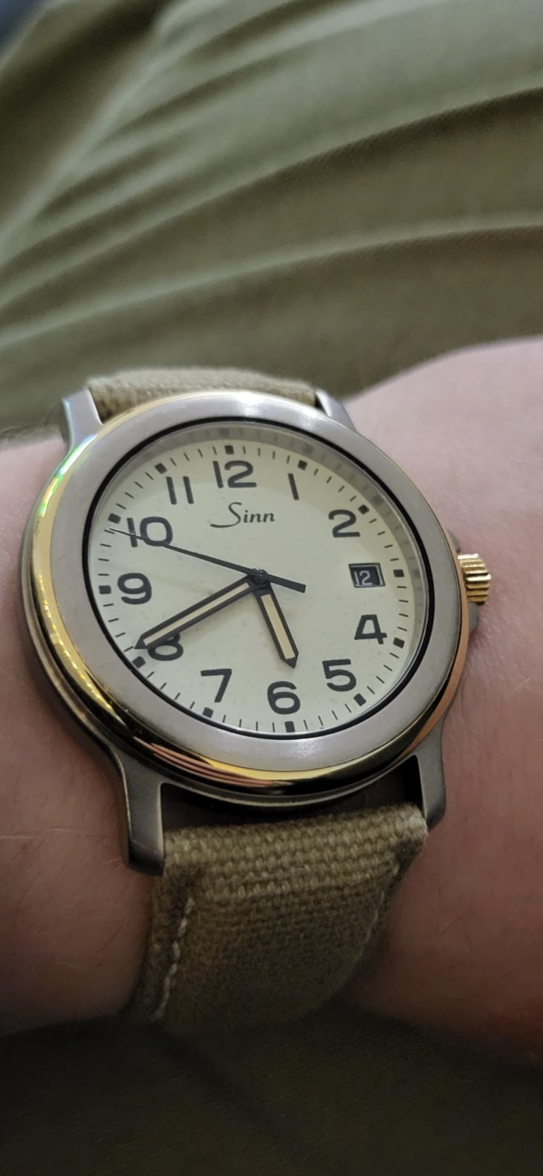 Sinn Titanium and Gold , full lume dial cosc movement , is this model
