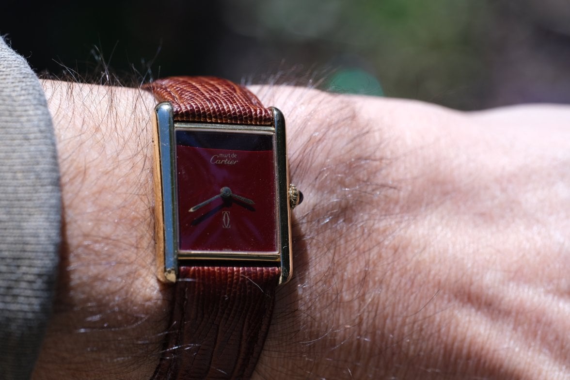 SOLD 1970s Cartier Tank Vermeil mechanical w RARE red dial and