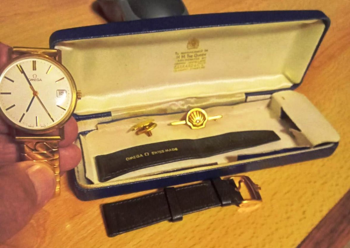 Omega gold with bracelet and original straps.jpg