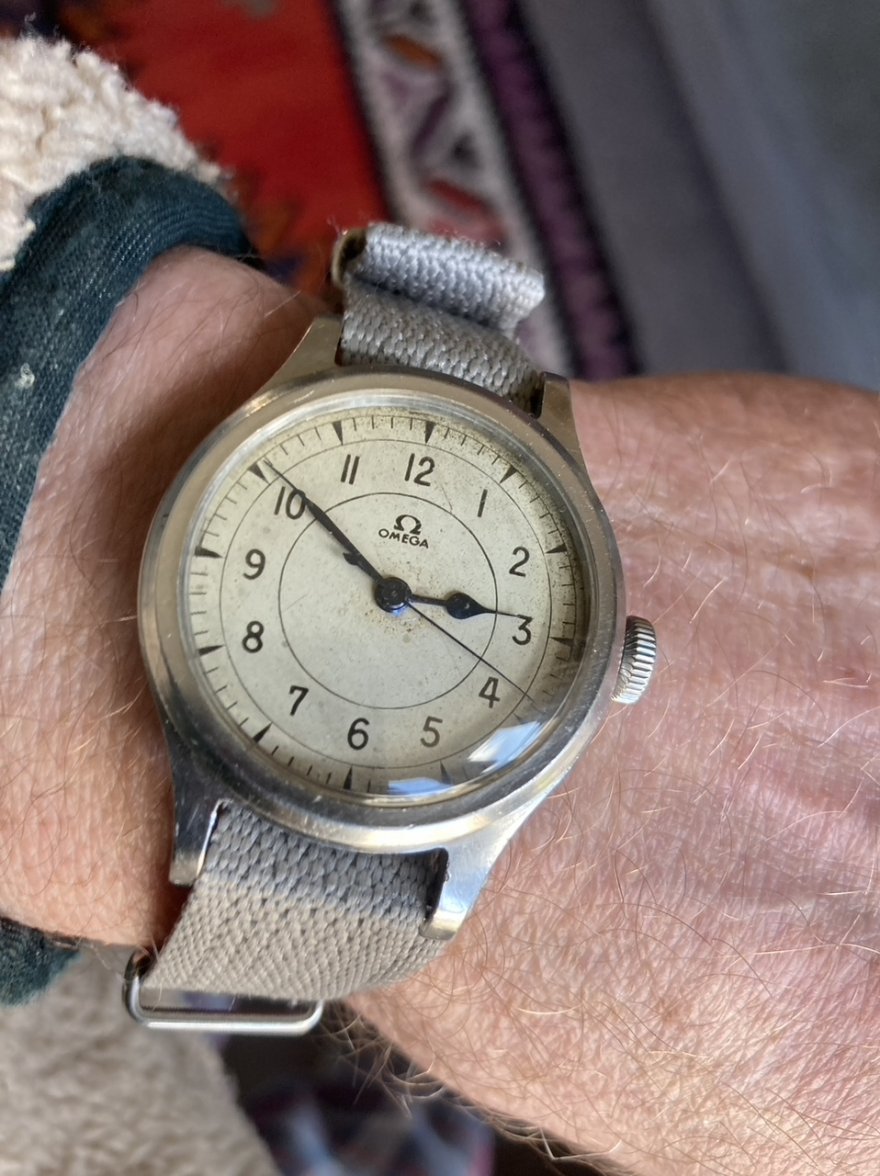 OMEGA '56 ON WRIST b. £1100.jpeg