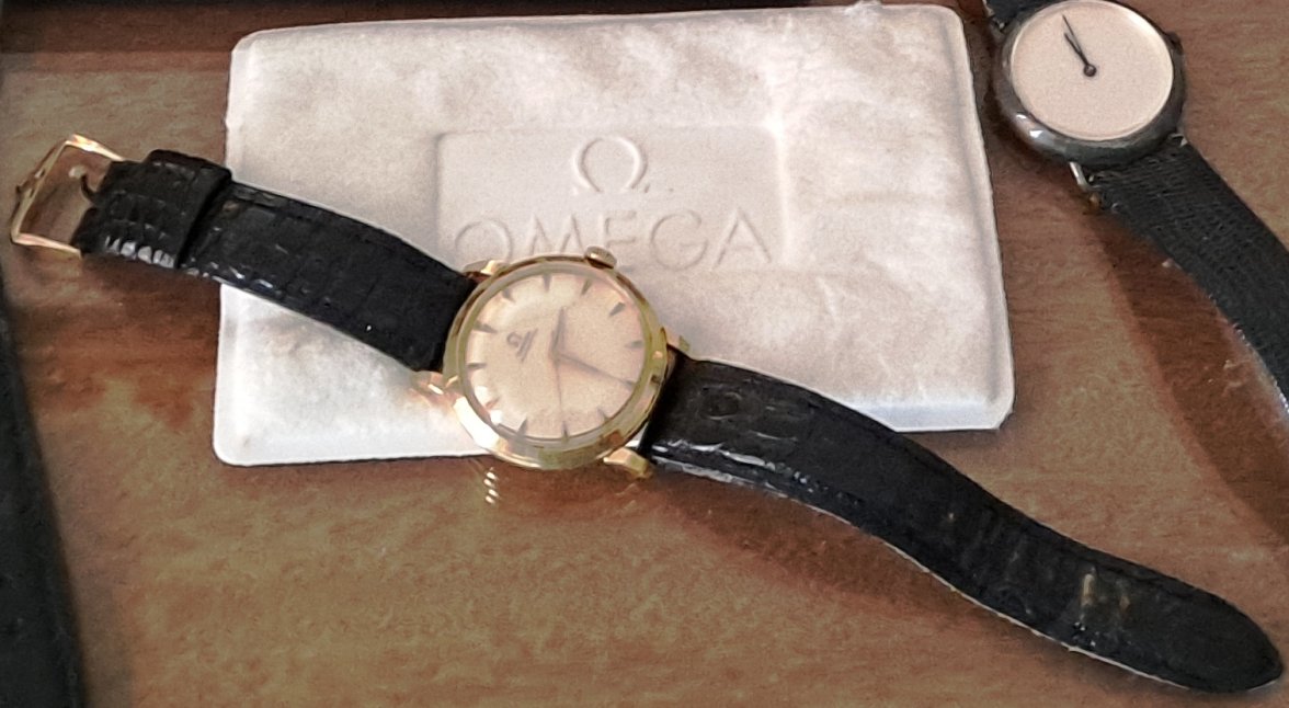 Omega 1952 14k Automatic.jpg