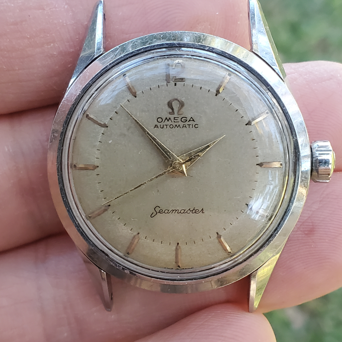 FS c. 1956 Omega Seamaster 2802 patina SS case gold furniture