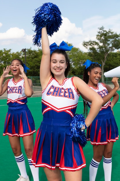 group-pretty-teenagers-cheerleader-uniforms_23-2149111118.jpg