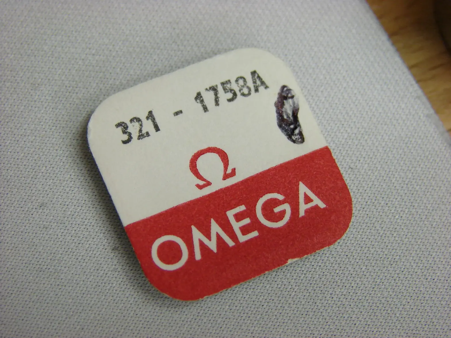 Omega Part 321.1758A zero action pusher stem (front) .webp
