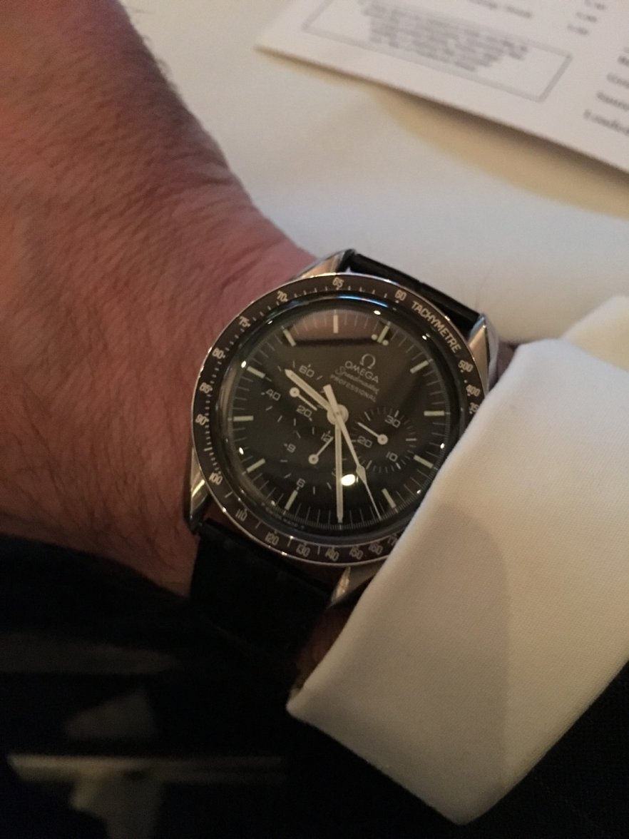 omega speedmaster with suit