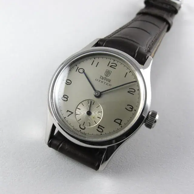 tudor-rolex-oyster-ref-4453-vintage-steel-wristwatch-circa-1945-wwtsoa-V01.webp