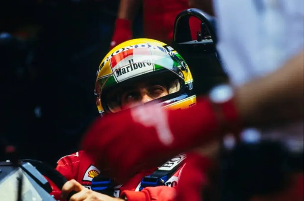 Senna crew member with F1.webp