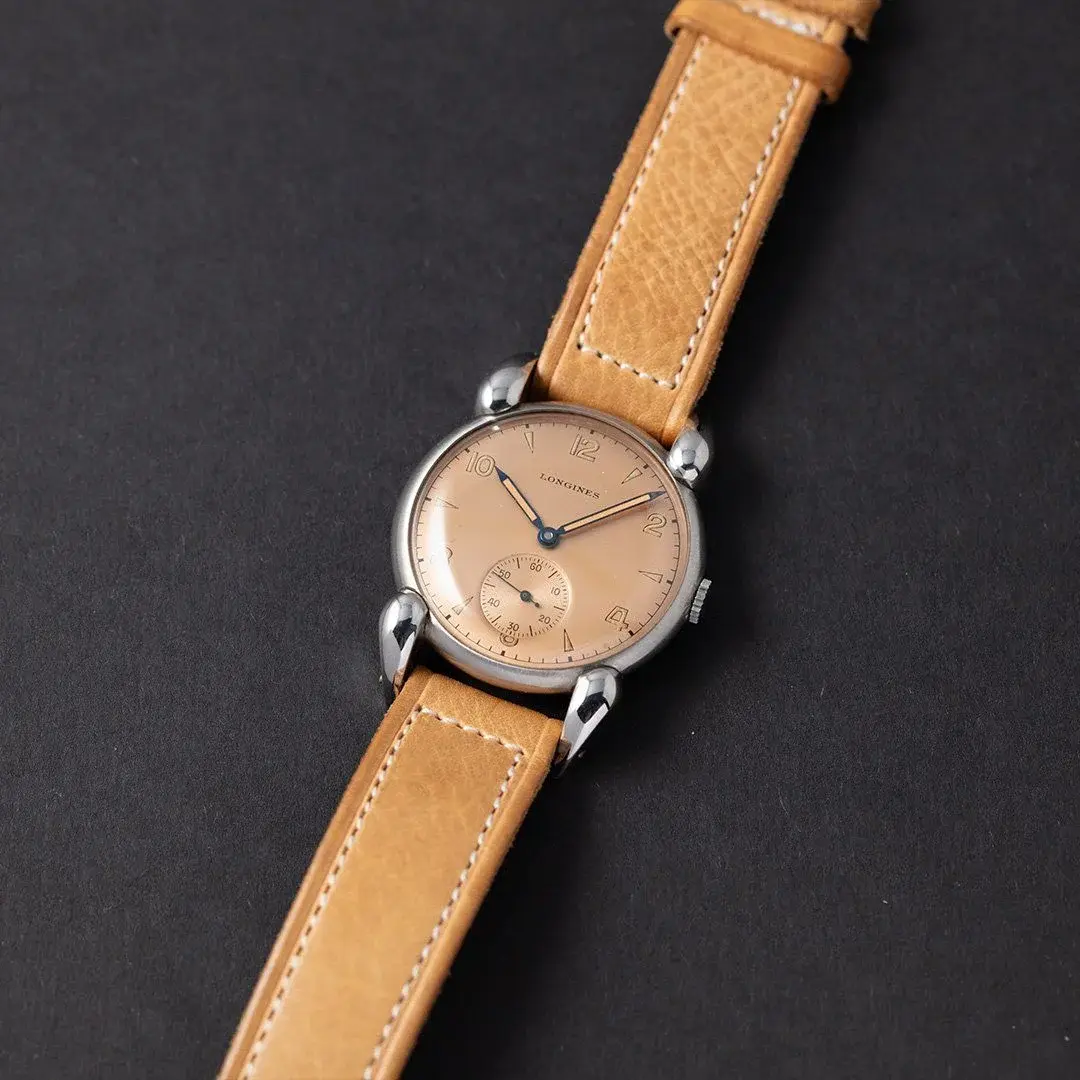 rare-1940er-longines-salmon-stainless-steel35mm-fancy-lugs (5).webp