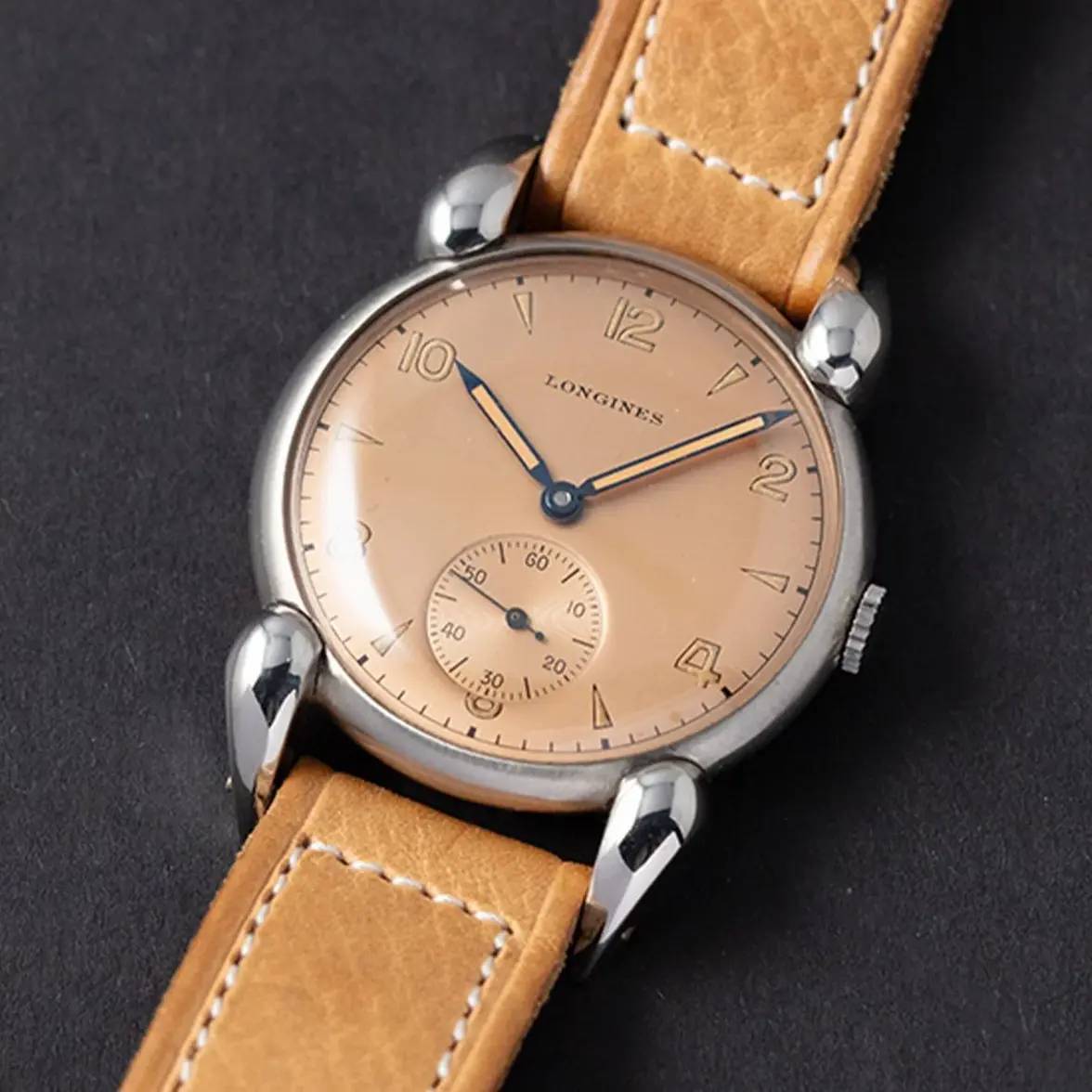 rare-1940er-longines-salmon-stainless-steel35mm-fancy-lugs.webp
