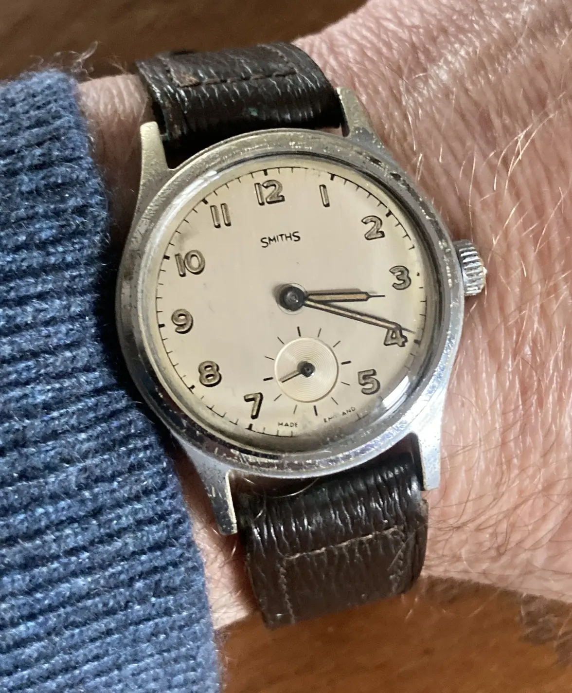 SMITHS HILLARY ON WRIST.webp