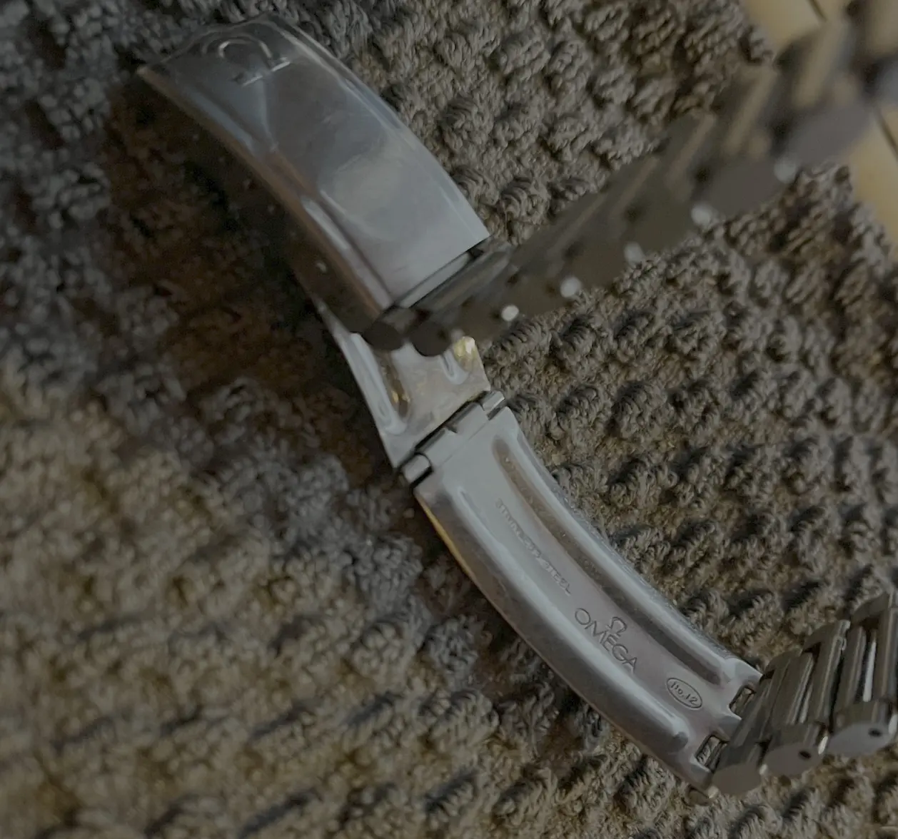 omega bracelet clasp detail.webp