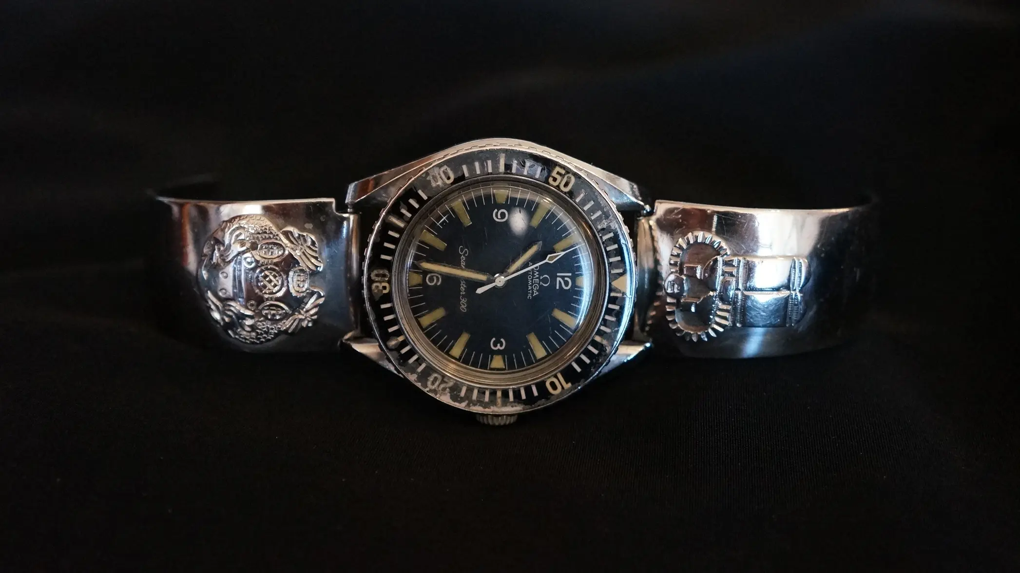 Olongapo bracelet with US Armed Forces Deep Diver 1st Class symbols.webp