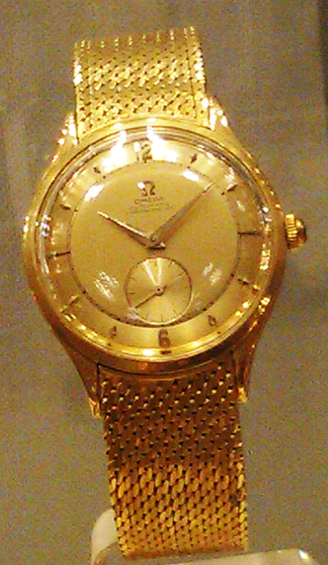B19 case 6 centenaries watch no 5 with gold bracelet.jpg