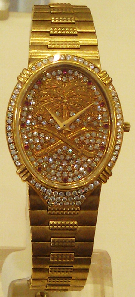 E21 Case 90 Saudi royal symbol all gold and diamond watches.jpg