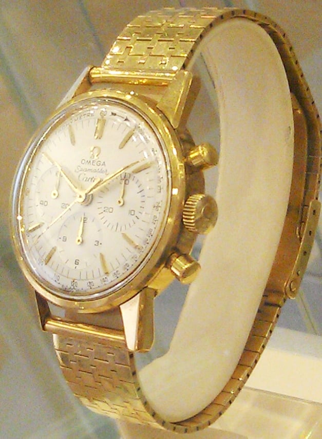 E29 Case 91 Official retailer Gold Seamaster 320 Cartier watch.jpg