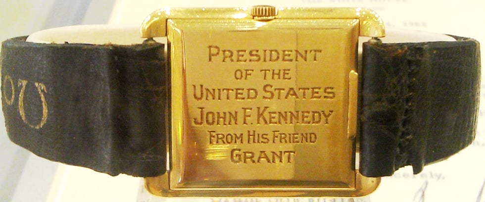 E65  Case 101  JFK watch case back.jpg