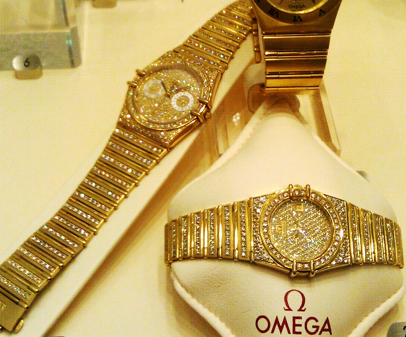 F51 Double claw Connie all gold and diamond watches.jpg