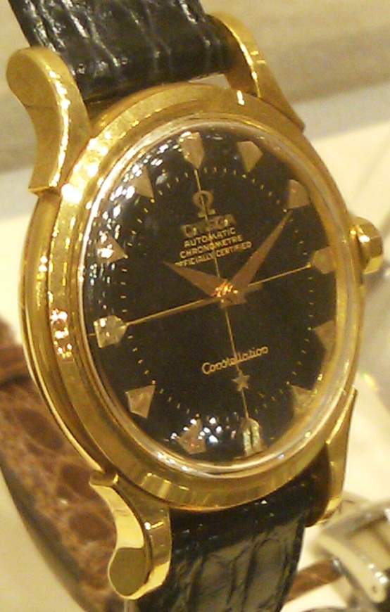 F27 Case 67 Year 50 60 Connie gold case black dome dial AHM cross hair watch.jpg